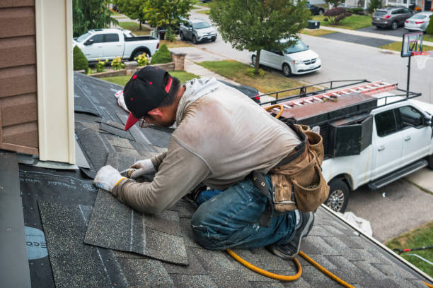 Professional Roofing technician working in Kingston, NH